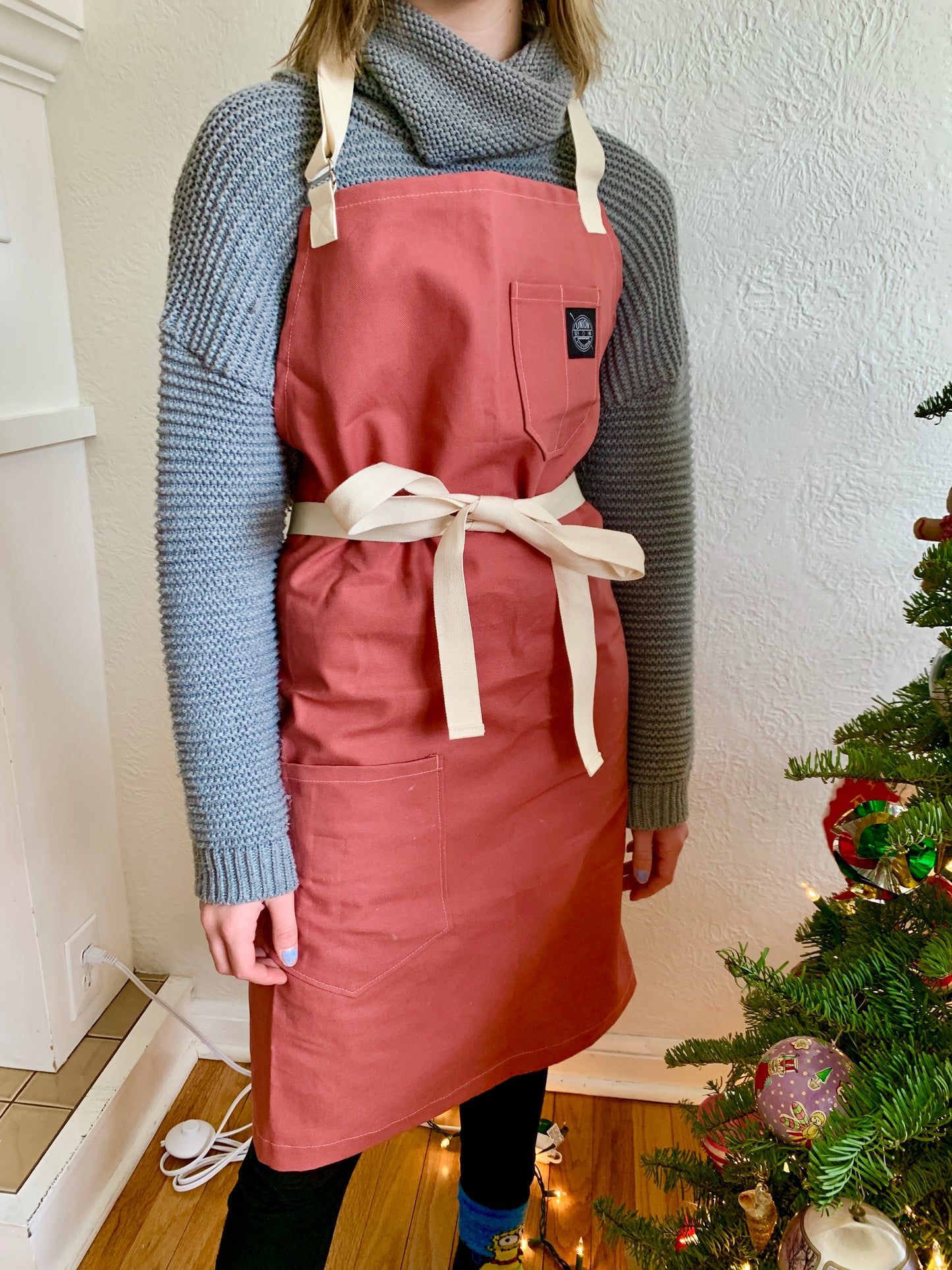 Person wearing Union Stitch & Design Home Chef Apron