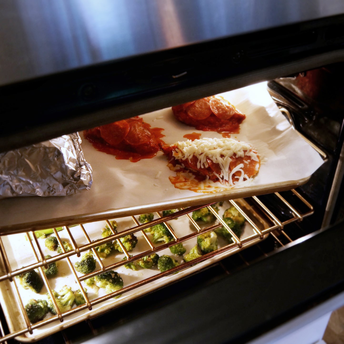 Pizza chicken coming out of the oven, for homemade tasting meal delivery