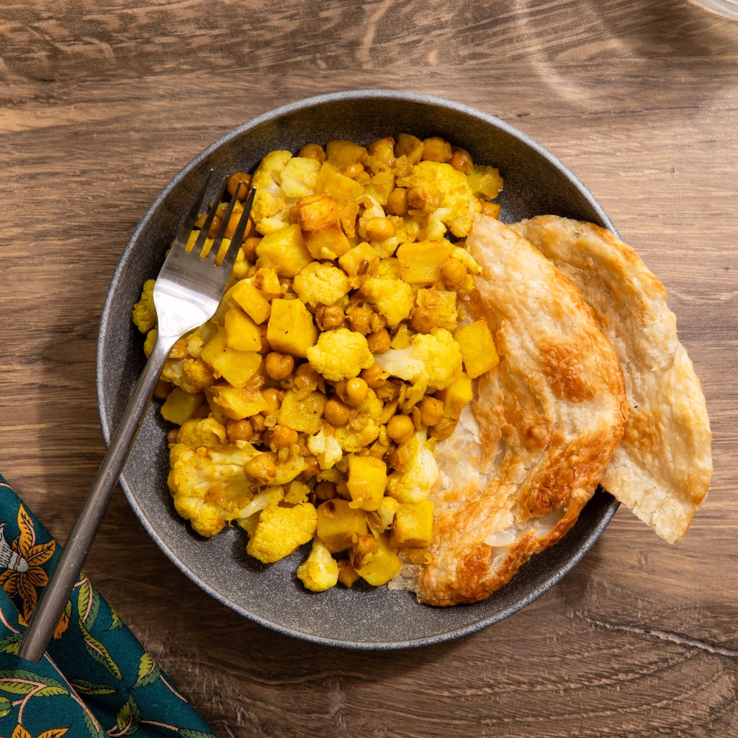 Curried Cauliflower with Chickpeas, Potatoes, & Roti Flatbread